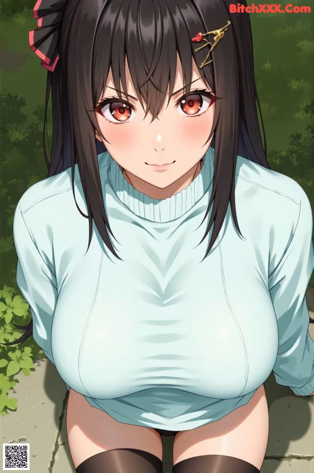 A woman in a blue shirt and black stockings posing for a picture.